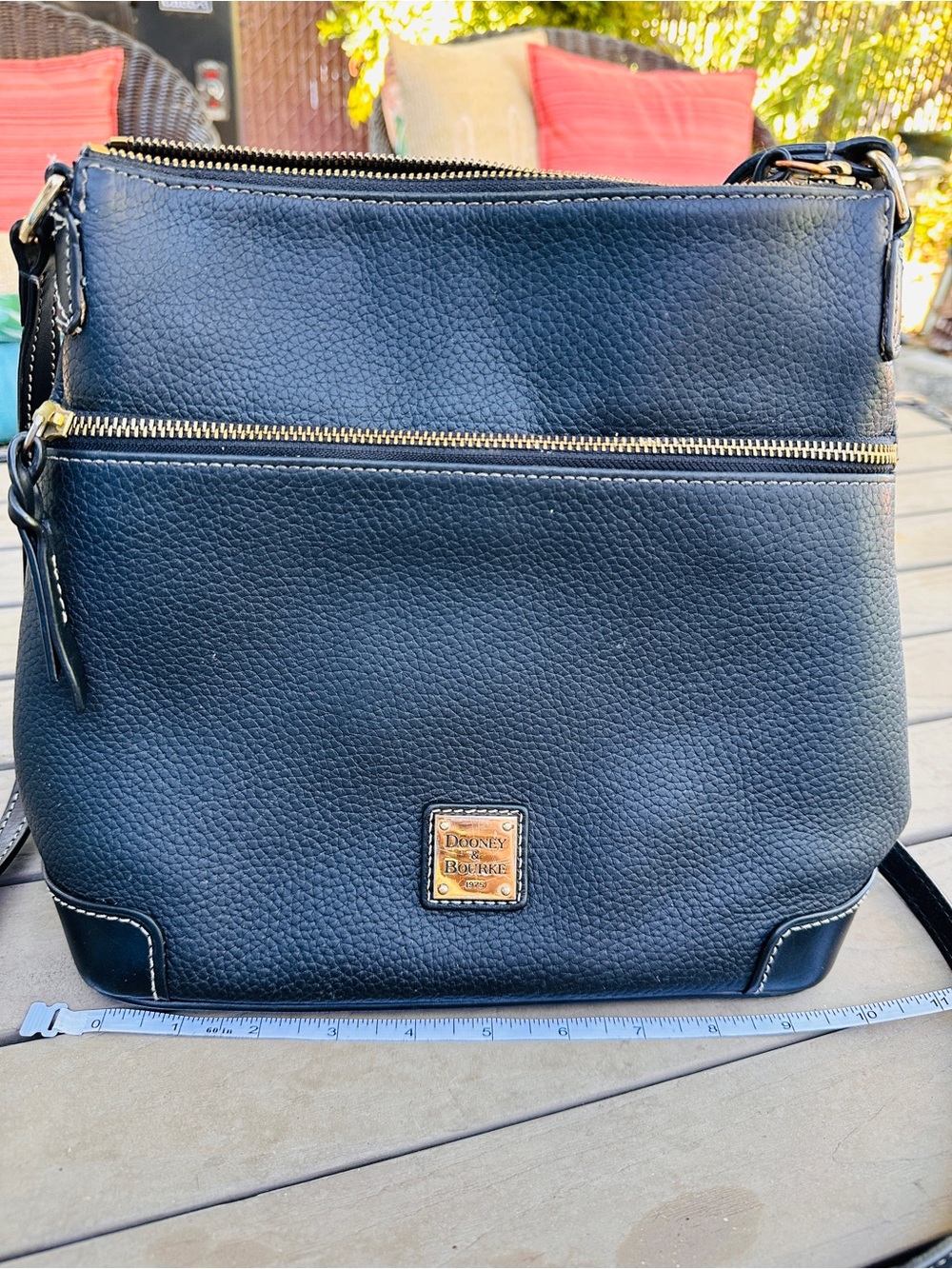 Dooney & Bourke Black Pebbled Leather Bag with Gold Hardware and Red lining